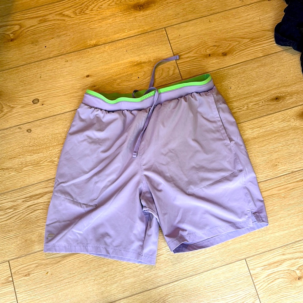 Fabletics men’s size large purple and green shorts